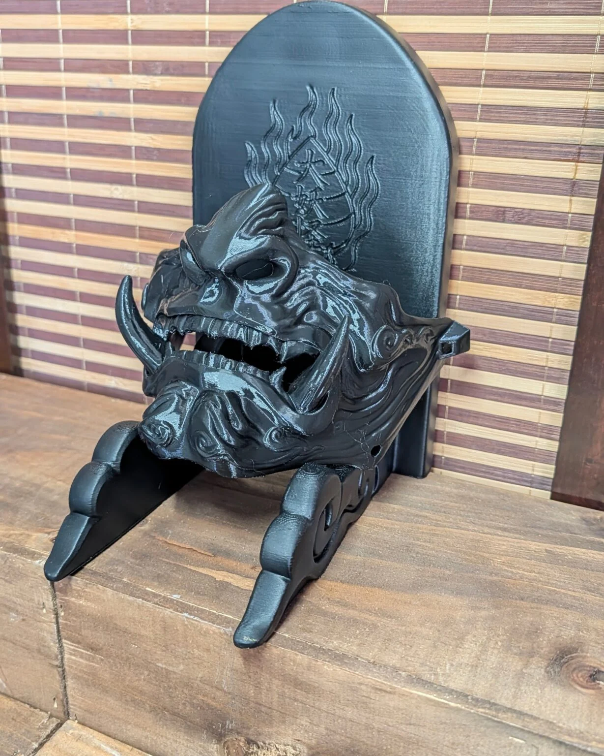 Black and gold kuro-kin horn detail on a handmade Oni Kuro half-mask, Dai Yokai